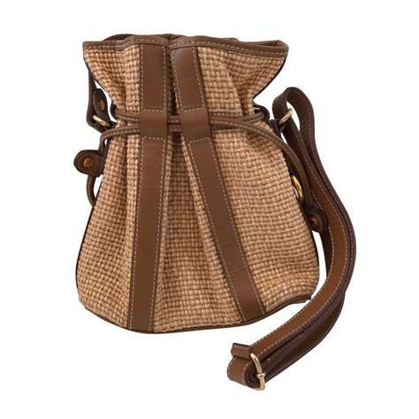 Sac seau en paille, maille et cuir Beige / cognac .